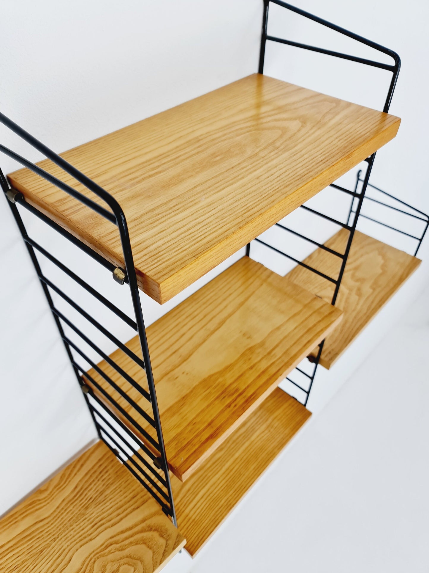 Original MCM Oak shelving system - consists of Black lacquered metal ladders, from string Stockholm 1960s