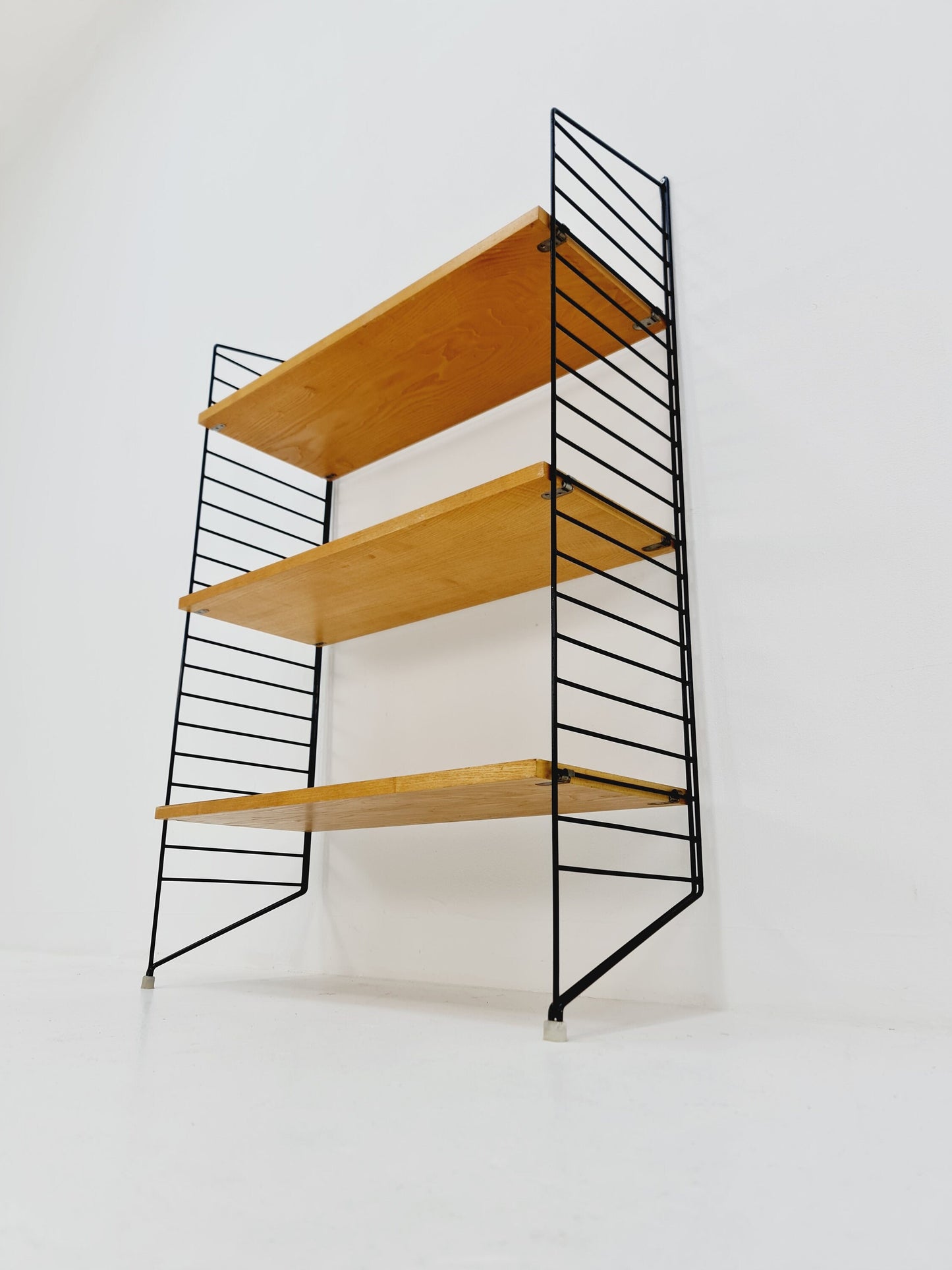 Original MCM Ash wood shelving system - consists of black lacquered metal ladders, from string Stockholm 1960s