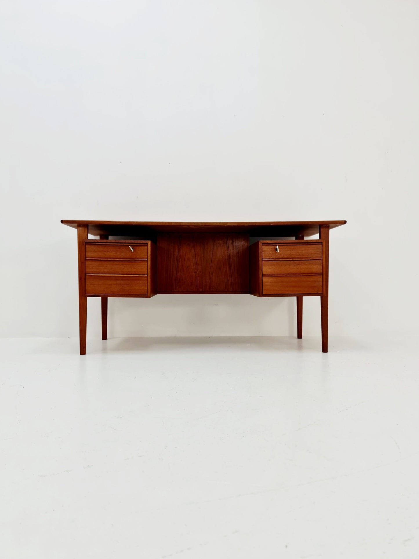 Danish teak desk by Peter Løvig Nielsen for Løvig, Denmark, 1960s