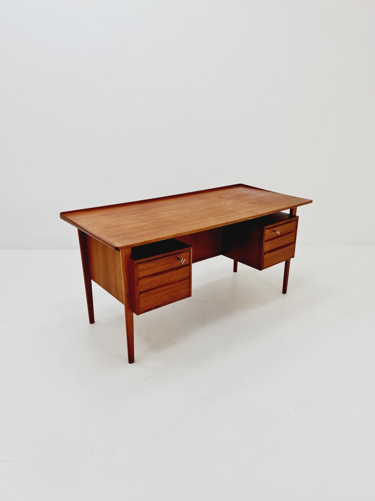 Danish teak desk by Peter Løvig Nielsen for Løvig, Denmark, 1960s