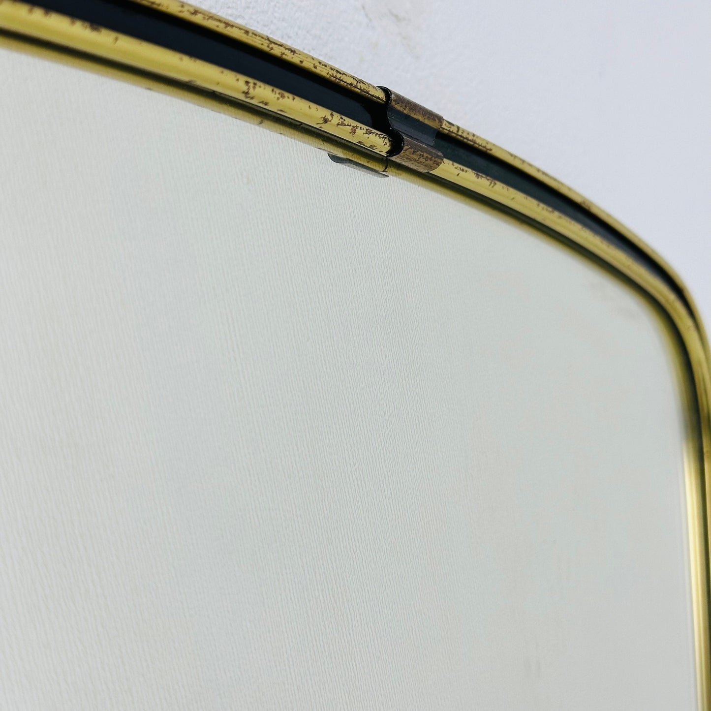 Mid century wall mirror brass framed with black edging 1950s