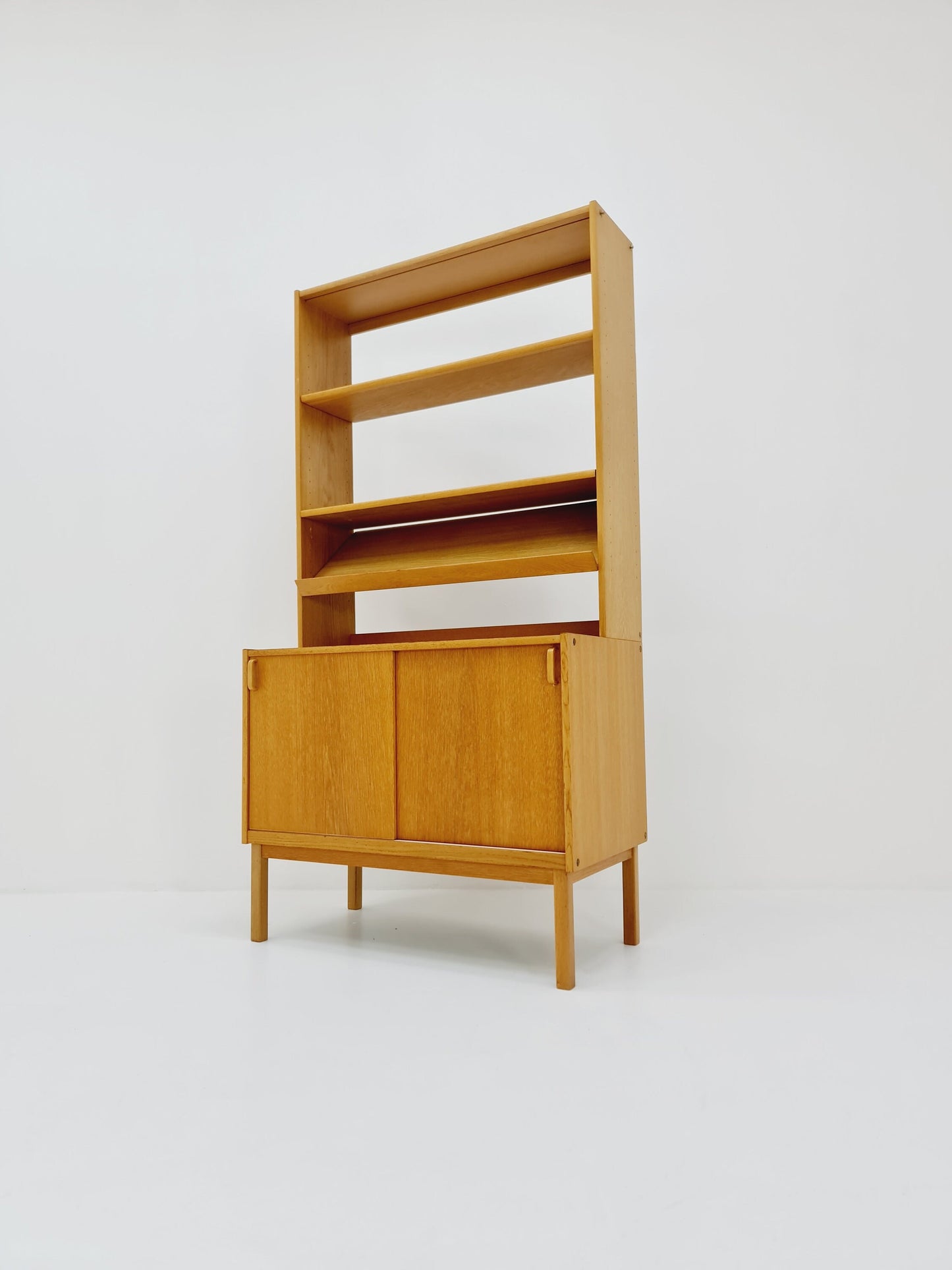 Swedish vintage book case with news Papper shelf oak by Fridhagen for Bodafors, 1960s