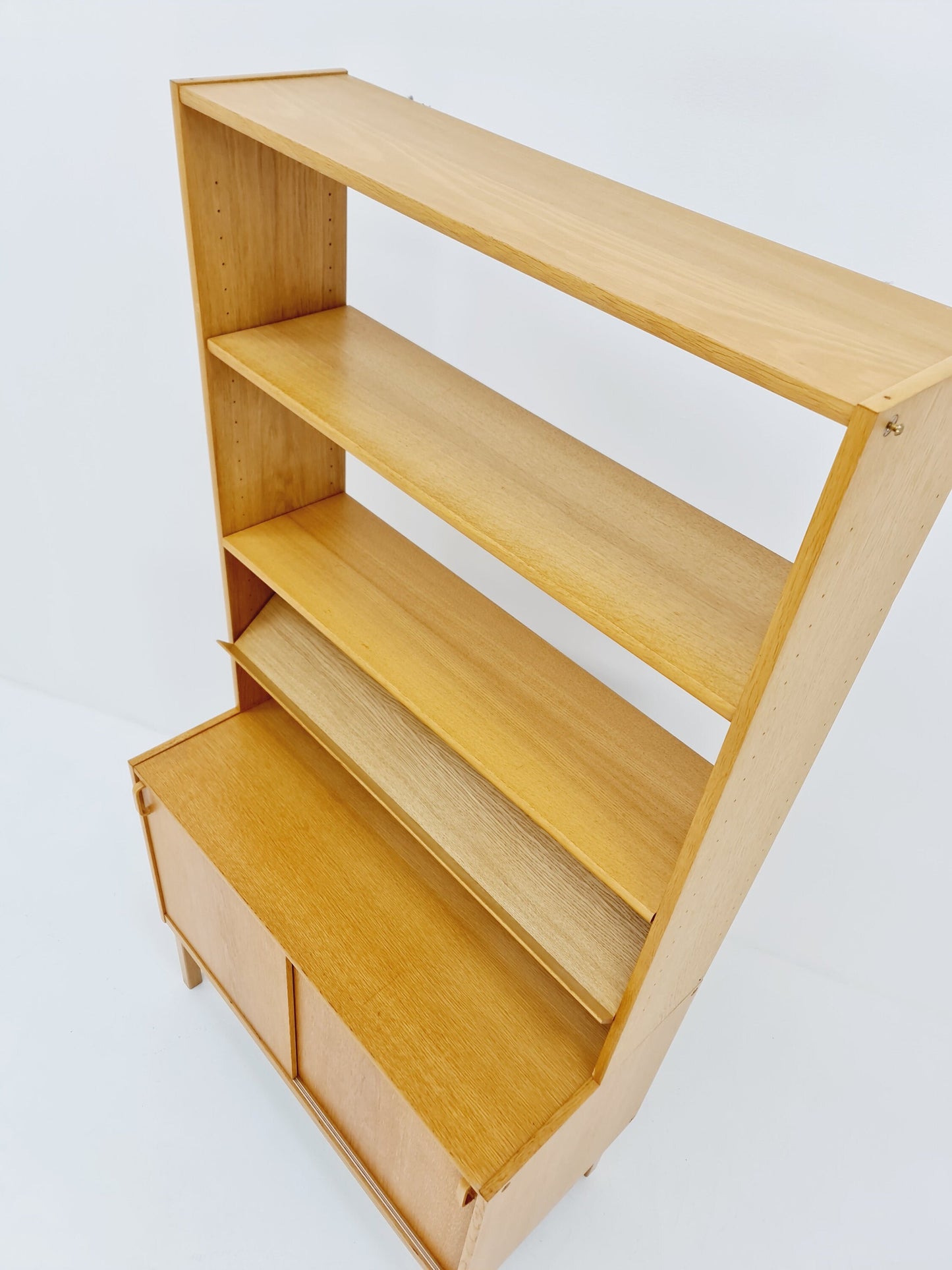 Swedish vintage book case with news Papper shelf oak by Fridhagen for Bodafors, 1960s