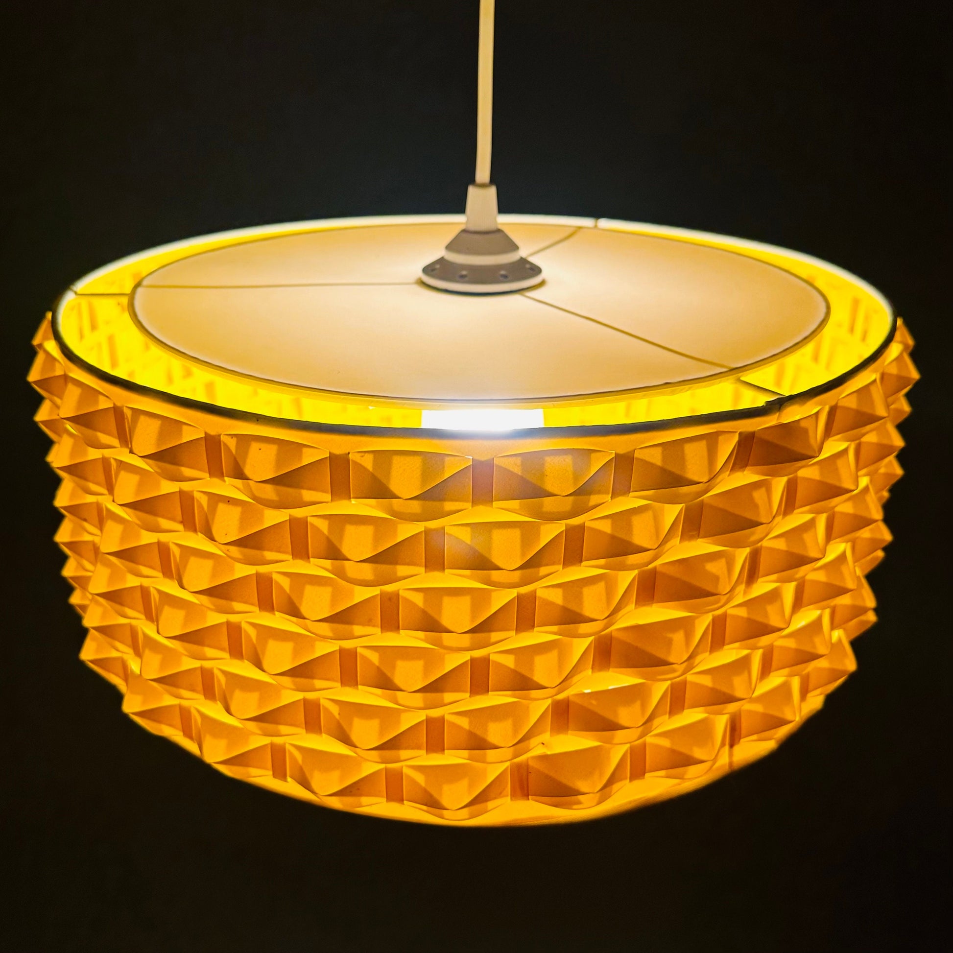 Rare Space age yellow plastic pendant lamp with fabric details 1970s