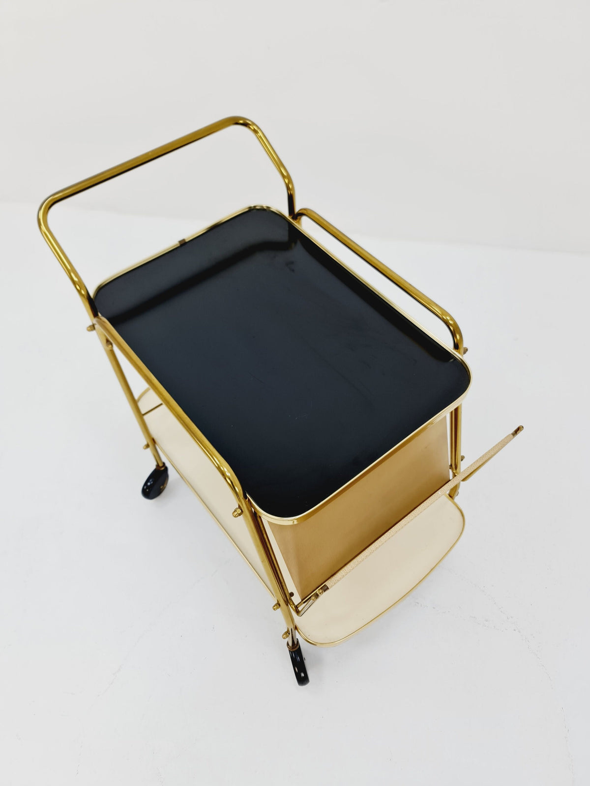 Vintage German mid century trolley bar cart in Brass with Magazine rack 1950s