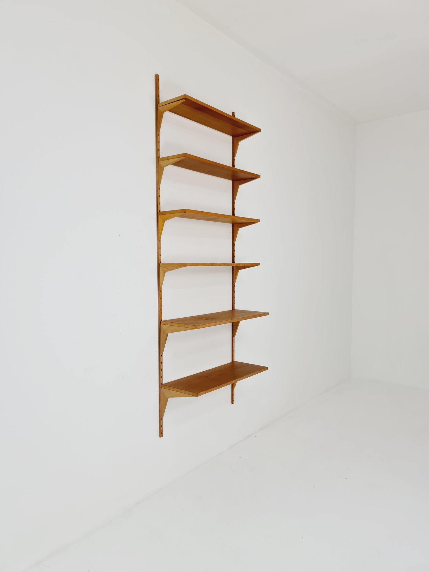 Midcentury Danish Oak Wall-Mounted Shelving Unit, by Poul Cadovius, 1960s