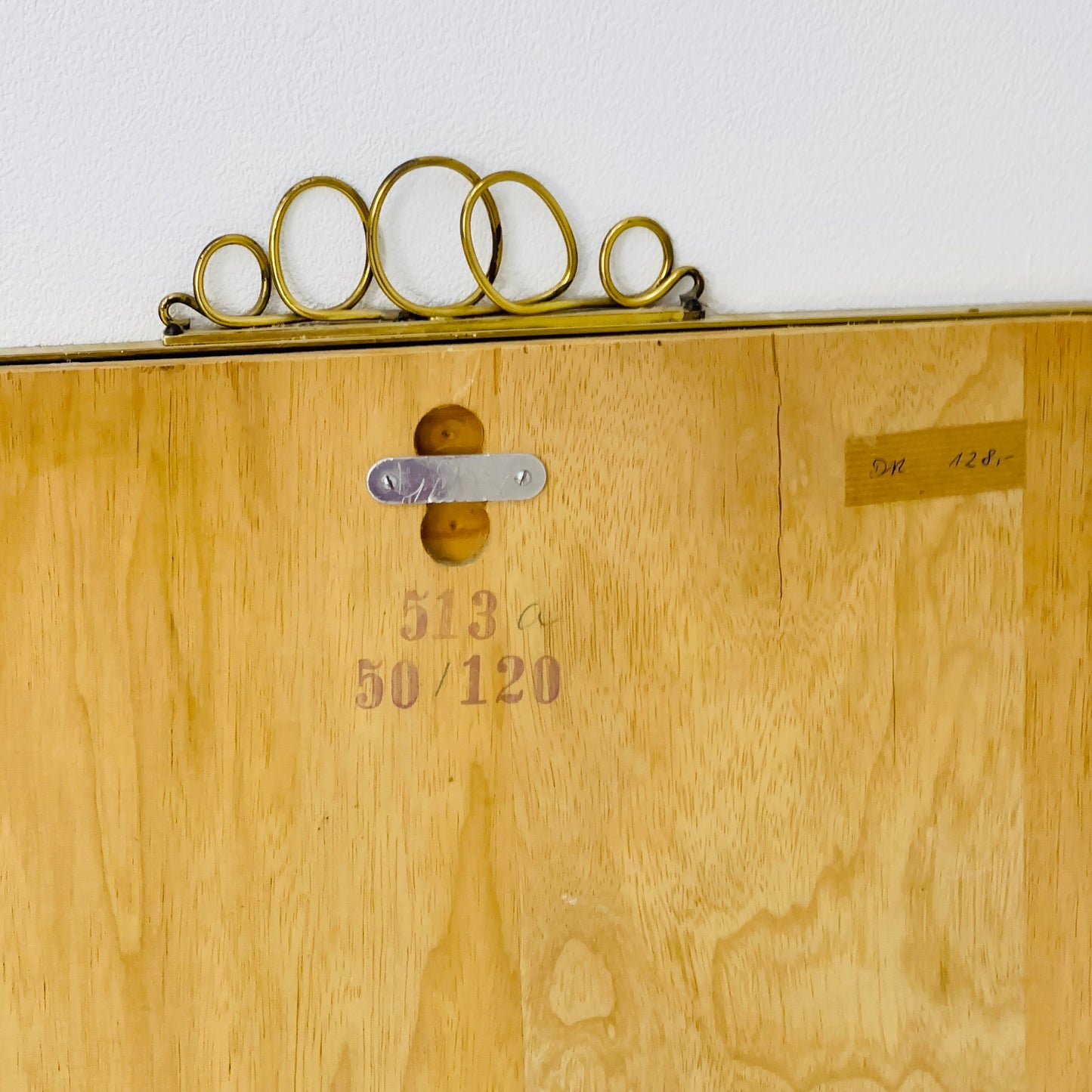 Mid century brass wall mirror with decorative bow 1950s, Italy
