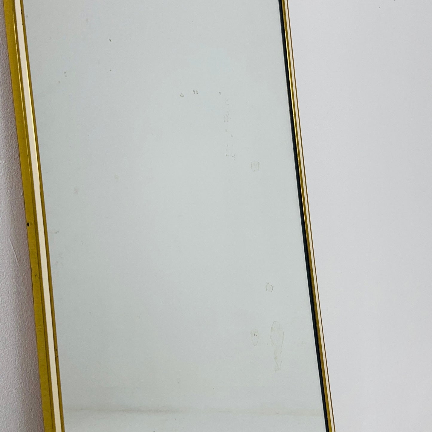 Mid century brass wall mirror with decorative bow 1950s, Italy