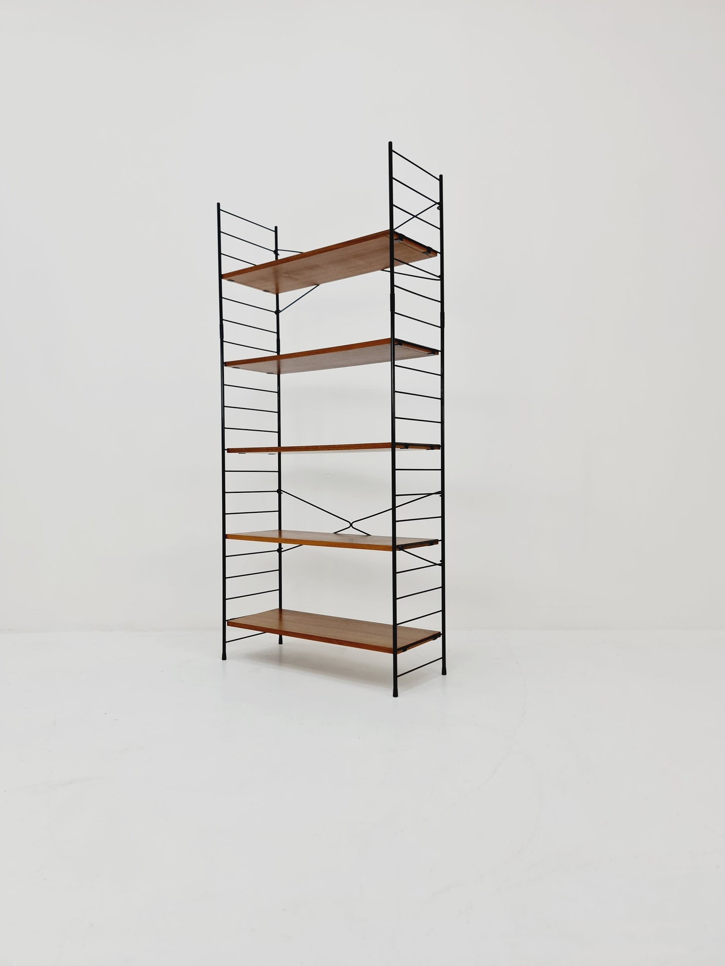 Freestanding string shelf in Teak from the 50s by WHB Germnay