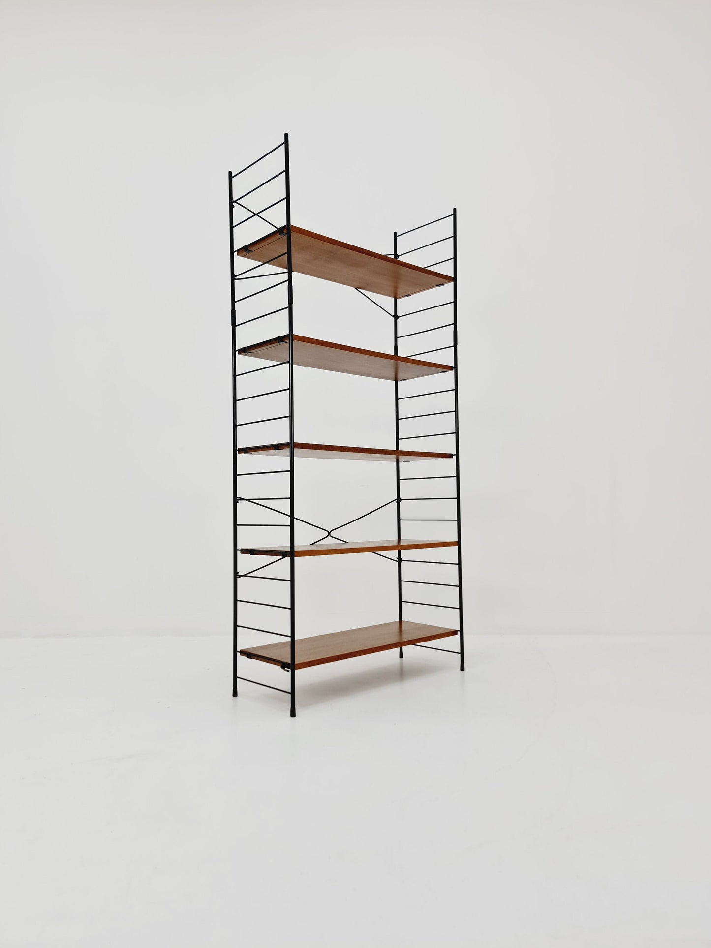 Freestanding string shelf in Teak from the 50s by WHB Germnay