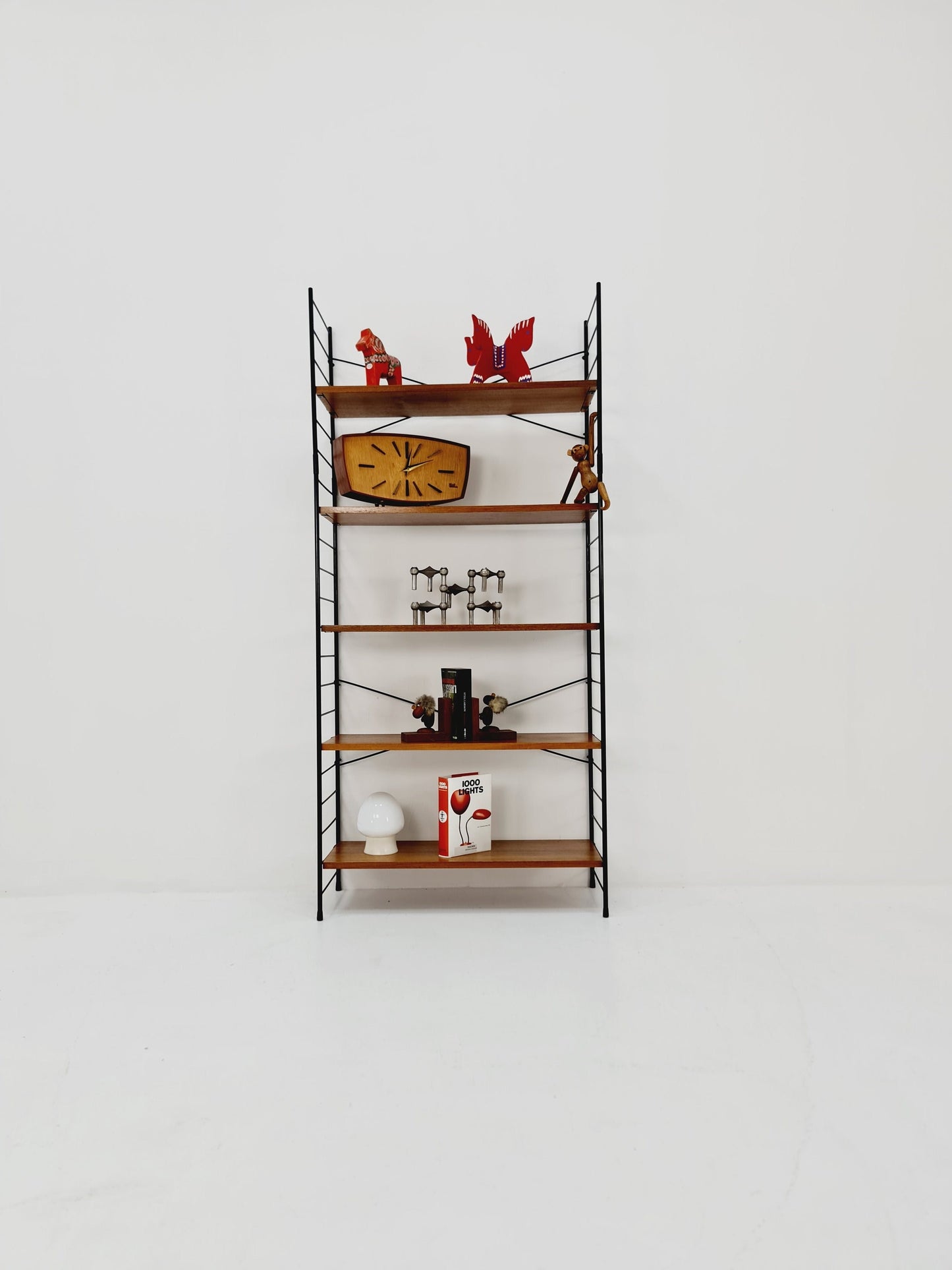 Freestanding string shelf in Teak from the 50s by WHB Germnay