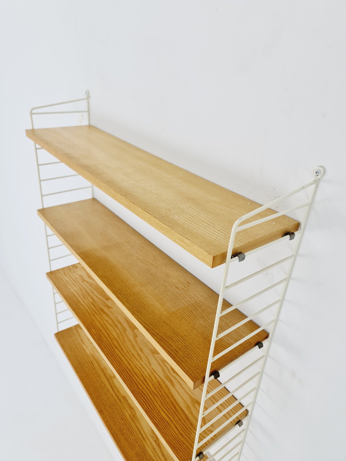 Original MCM Oak shelving system - consists of white lacquered metal ladders, from string Stockholm 1960s