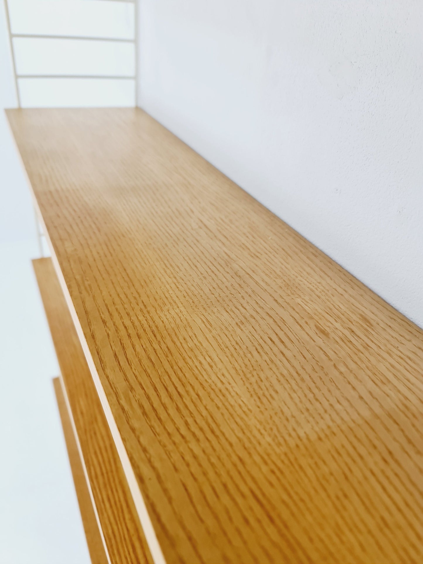 Original MCM Oak shelving system - consists of white lacquered metal ladders, from string Stockholm 1960s