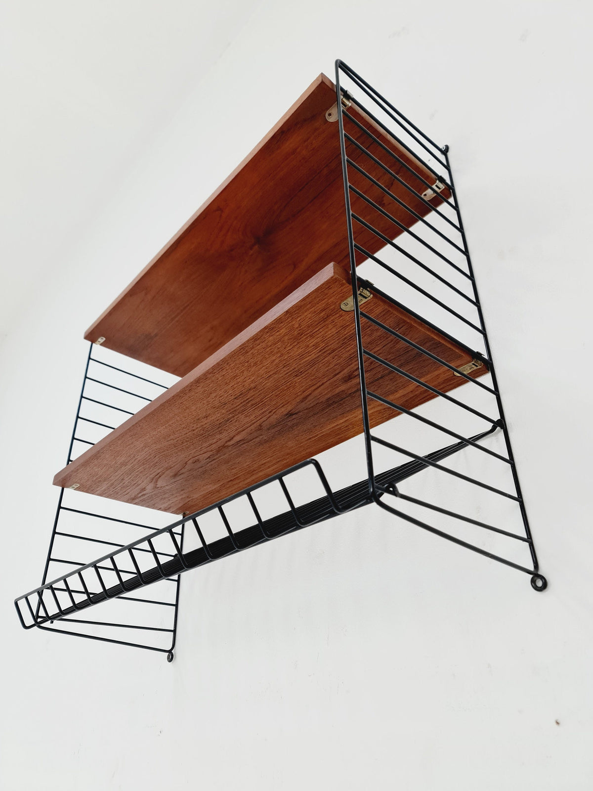 Original MCM Teak shelving system - consists of black lacquered metal ladders, from string Stockholm 1960s