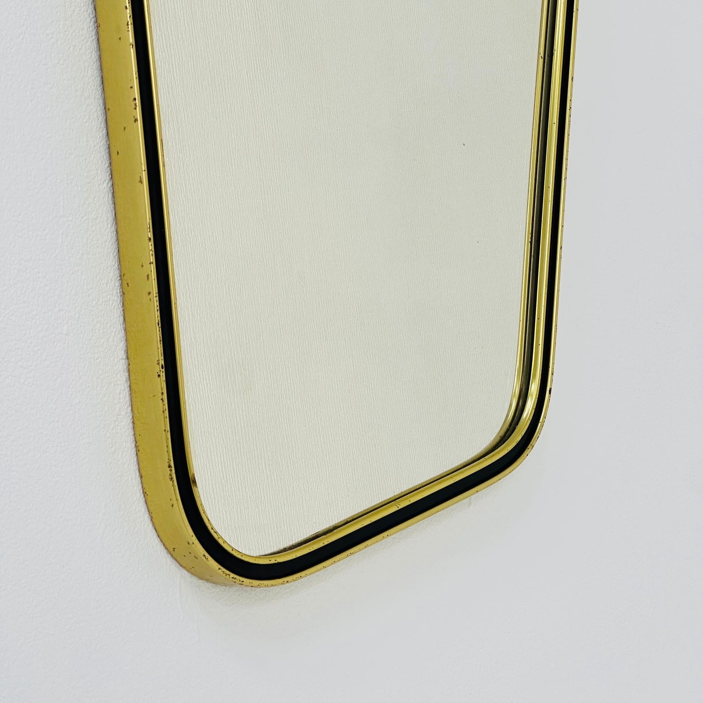 Mid century wall mirror brass framed with black edging 1950s