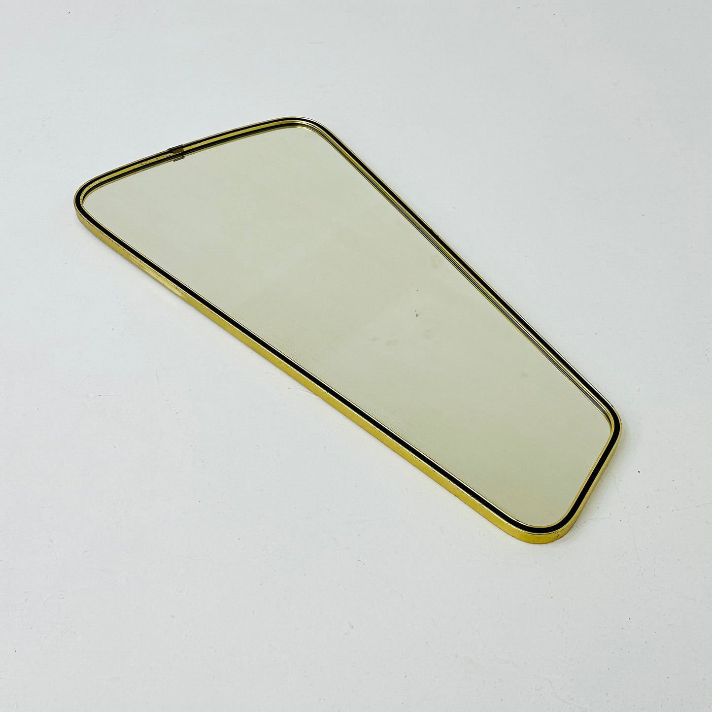 Mid century wall mirror brass framed with black edging 1950s