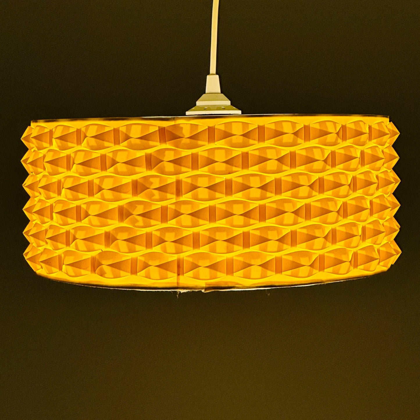 Rare Space age yellow plastic pendant lamp with fabric details 1970s
