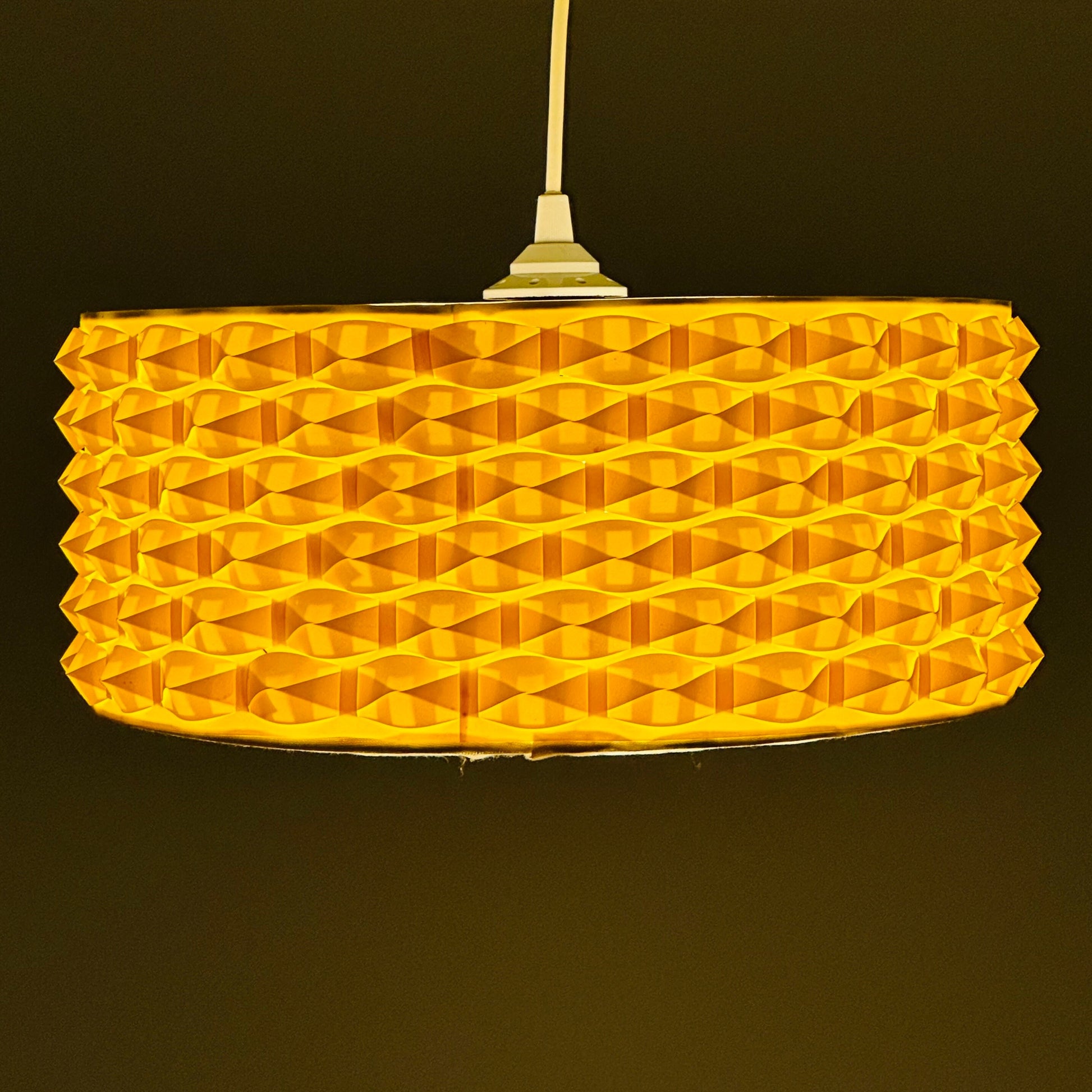 Rare Space age yellow plastic pendant lamp with fabric details 1970s