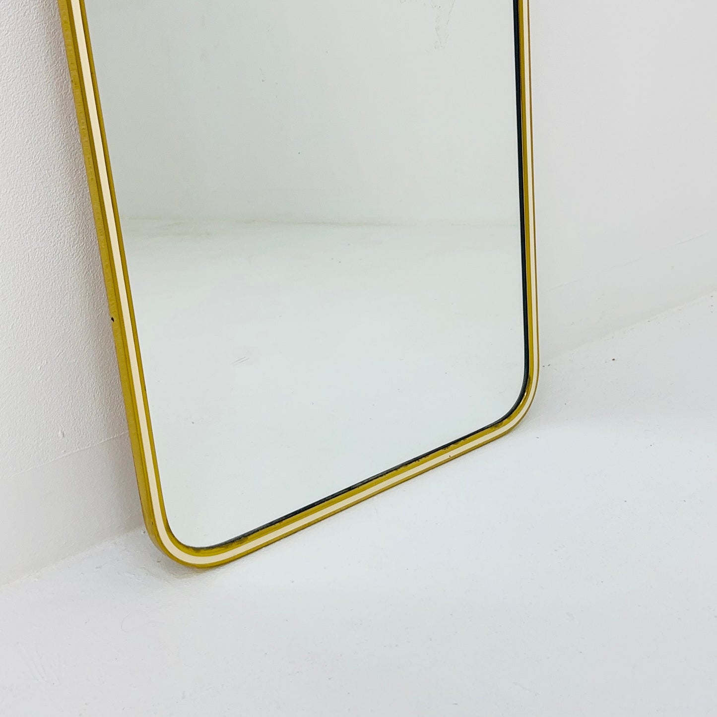Mid century brass wall mirror with decorative bow 1950s, Italy
