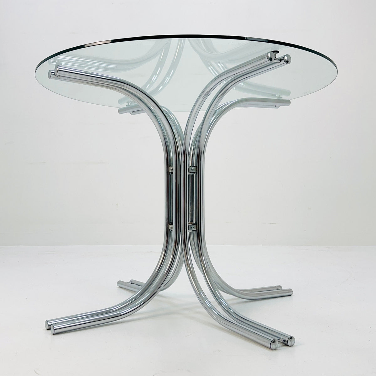 Mid century glass and chrome round dining table, Italy 1980s