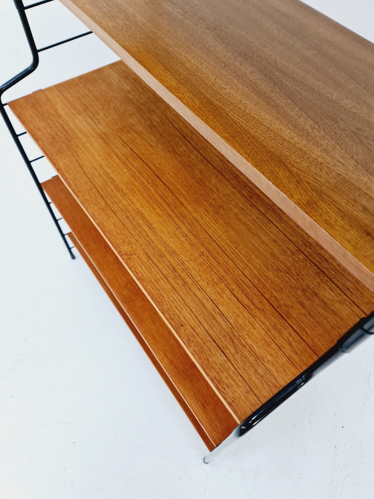 Freestanding vintage string bookshelf in Teak, 1950s by WHB Germnay