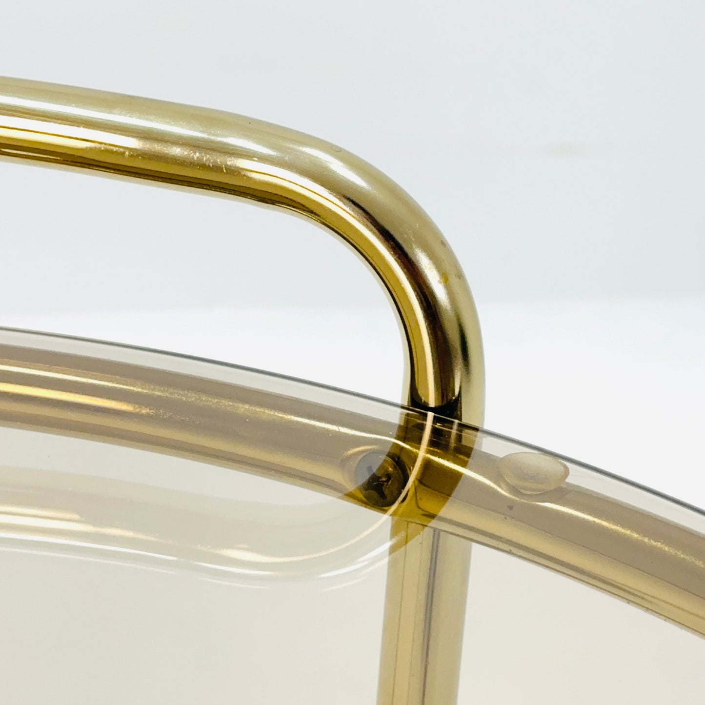 Mid Century Modern Bar/ Tea Cart Gold/Brass smoked Glass France 1970s .