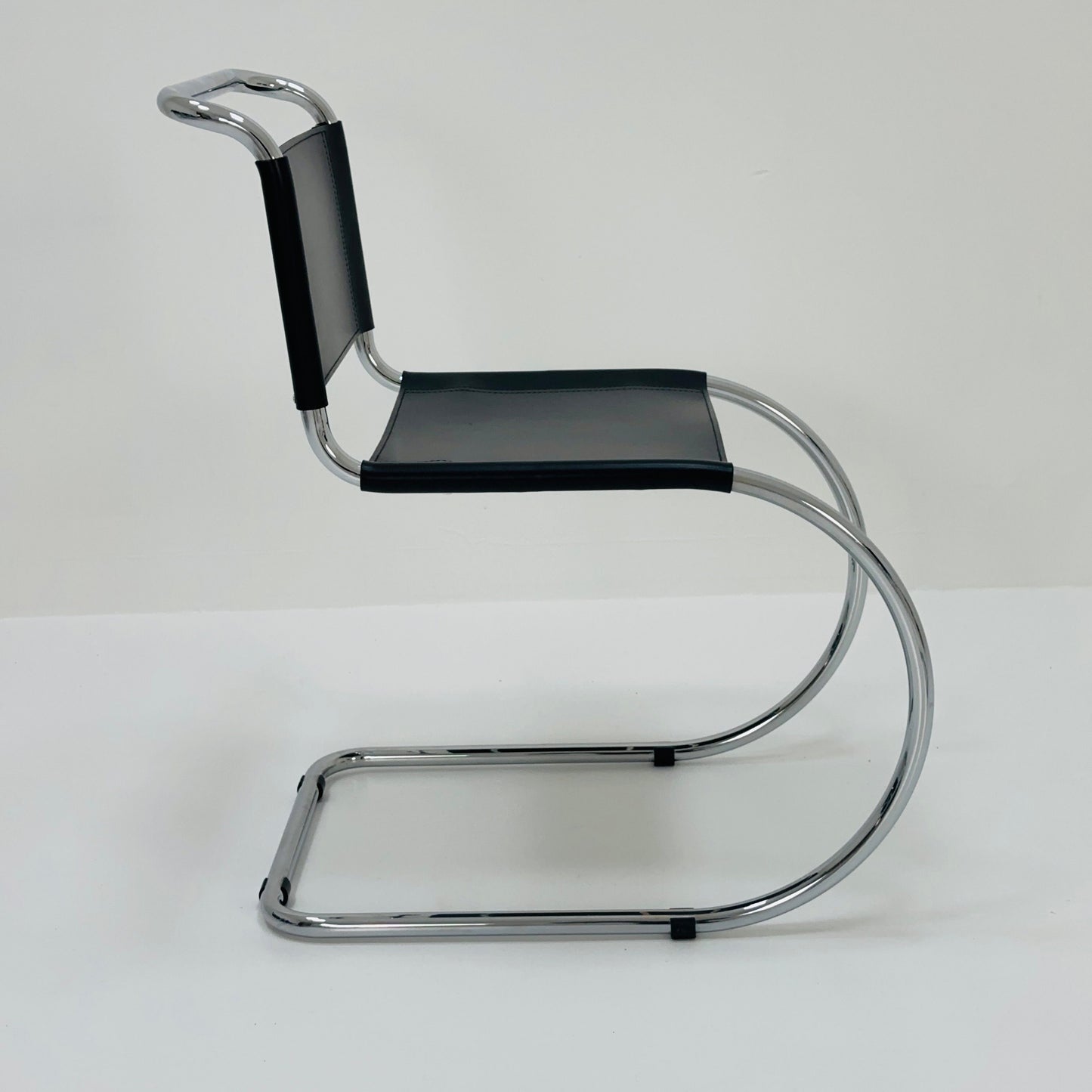 MR10 lounge black leather chair design by Ludwig Mies van der Rohe , 1980s