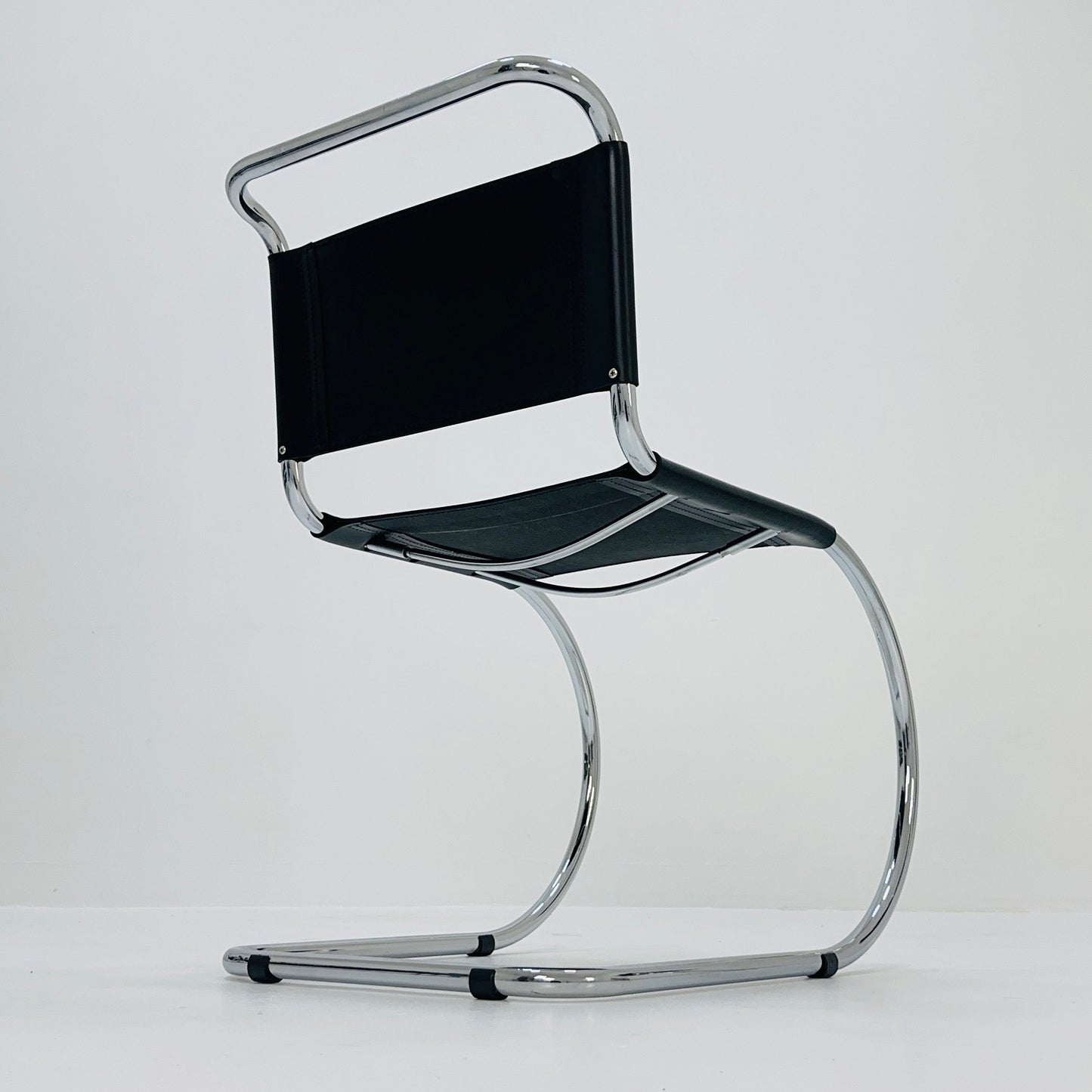 MR10 lounge black leather chair design by Ludwig Mies van der Rohe , 1980s