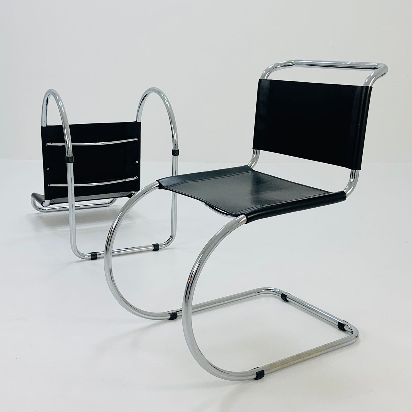 MR10 lounge black leather chair design by Ludwig Mies van der Rohe , 1980s
