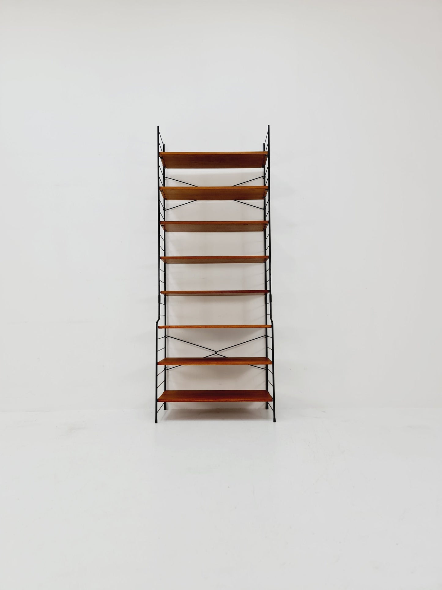Freestanding vintage string bookshelf in Teak, 1950s by WHB Germnay