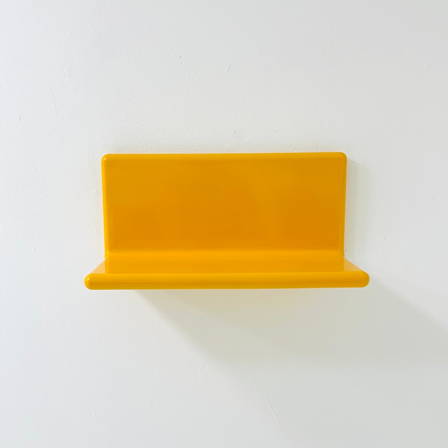 Space age retro yellow wall shelf , west Germany 1980s