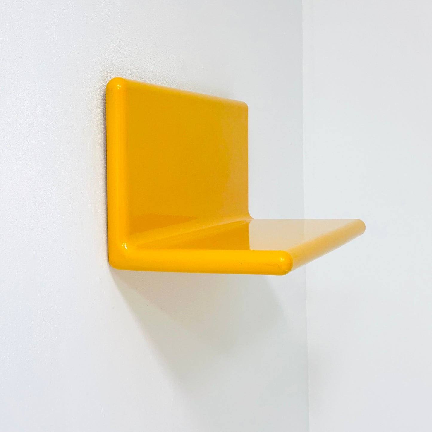 Space age retro yellow wall shelf , west Germany 1980s