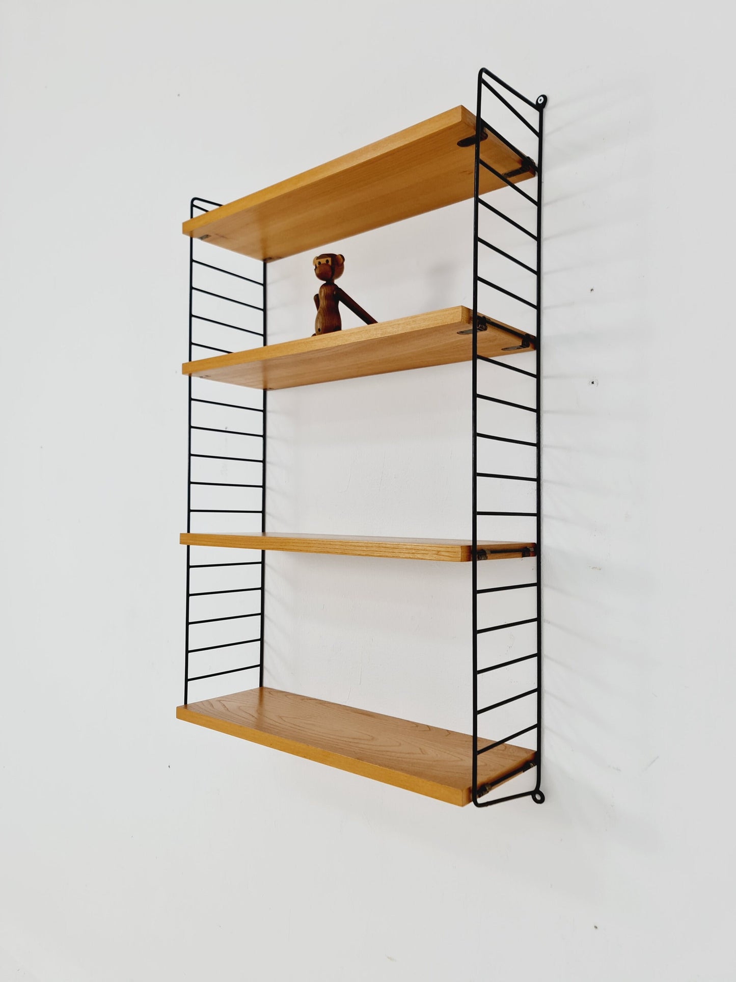 Original MCM Ash shelving system - consists of Black lacquered metal ladders, from string Stockholm 1960s