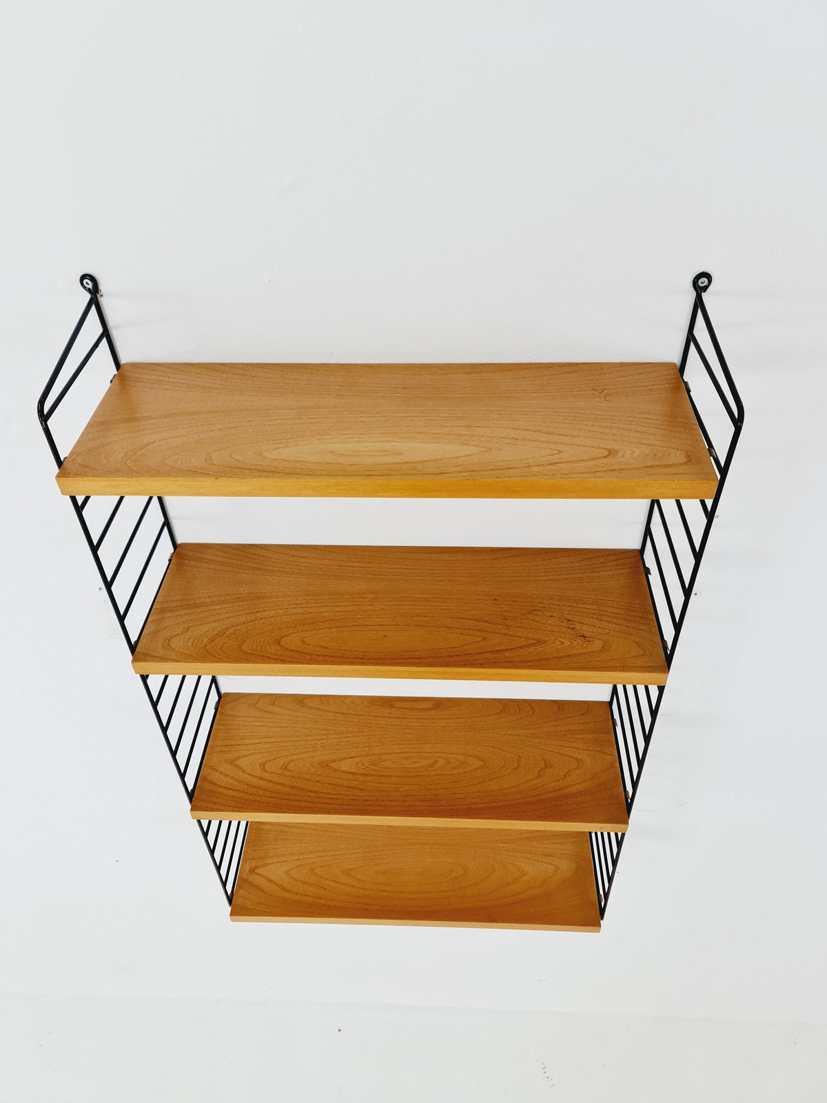 Original MCM Ash shelving system - consists of Black lacquered metal ladders, from string Stockholm 1960s