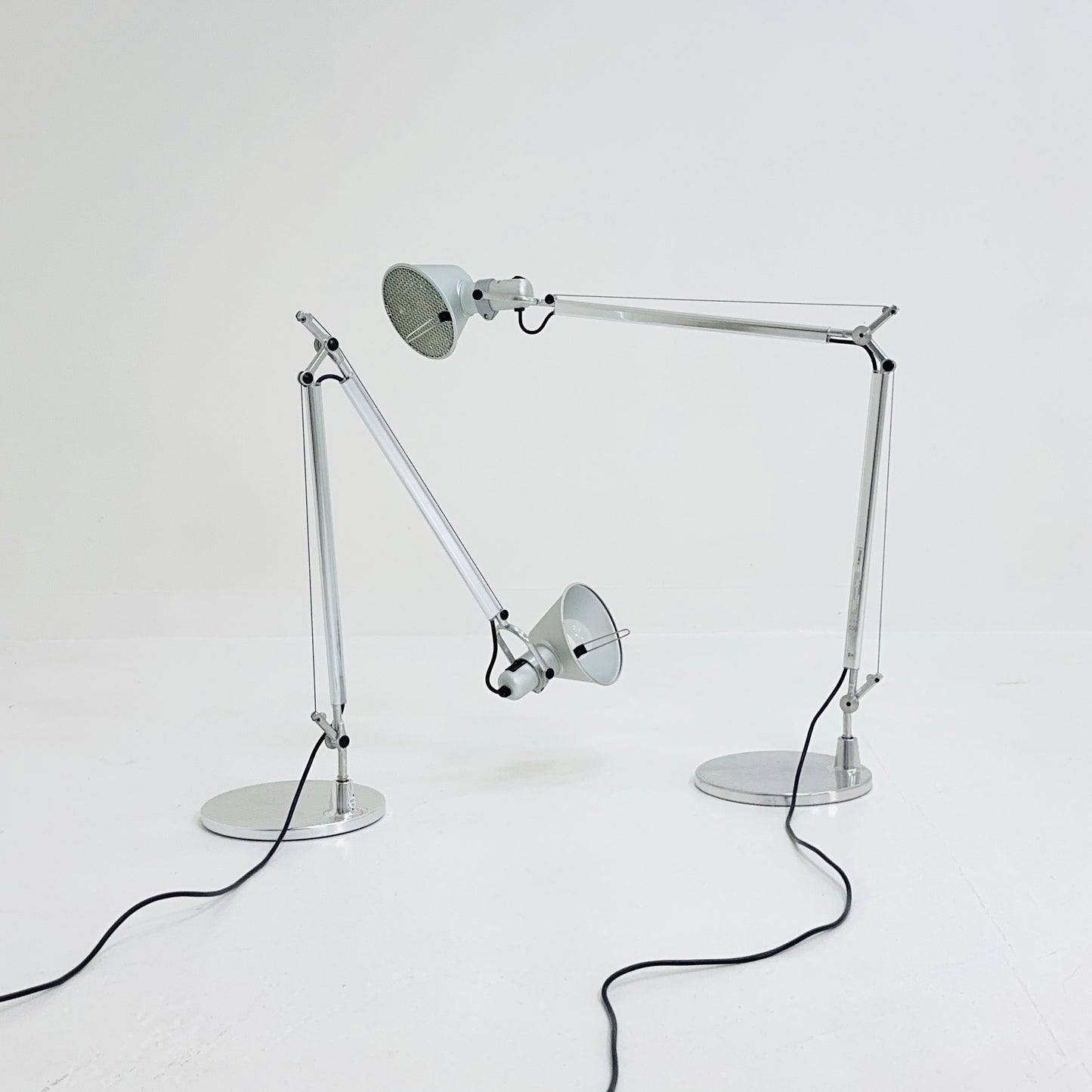 A pair of 'Tolomeo' desktop lamps by Michele De Lucchi & Giancarlo Fassina for Artemide. Italy