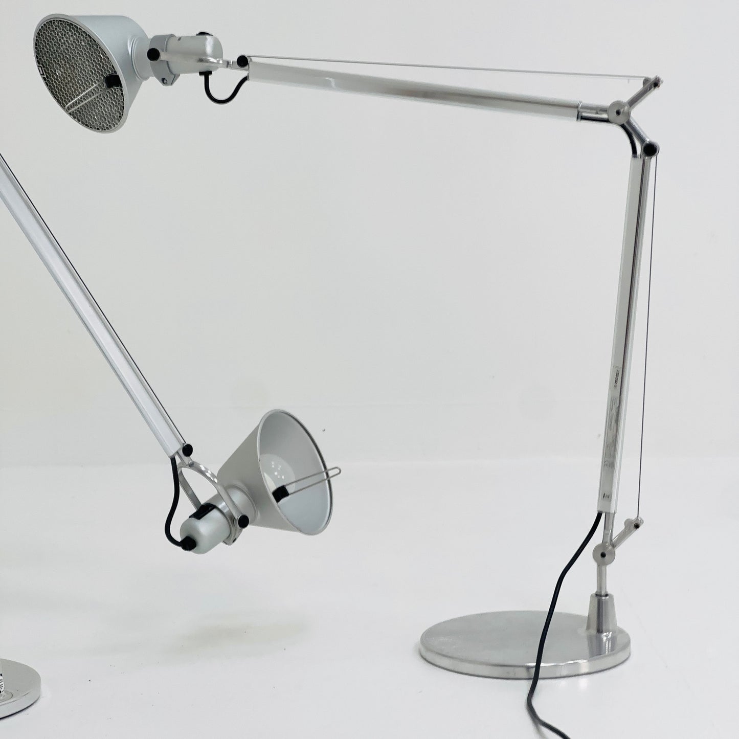 A pair of 'Tolomeo' desktop lamps by Michele De Lucchi & Giancarlo Fassina for Artemide. Italy