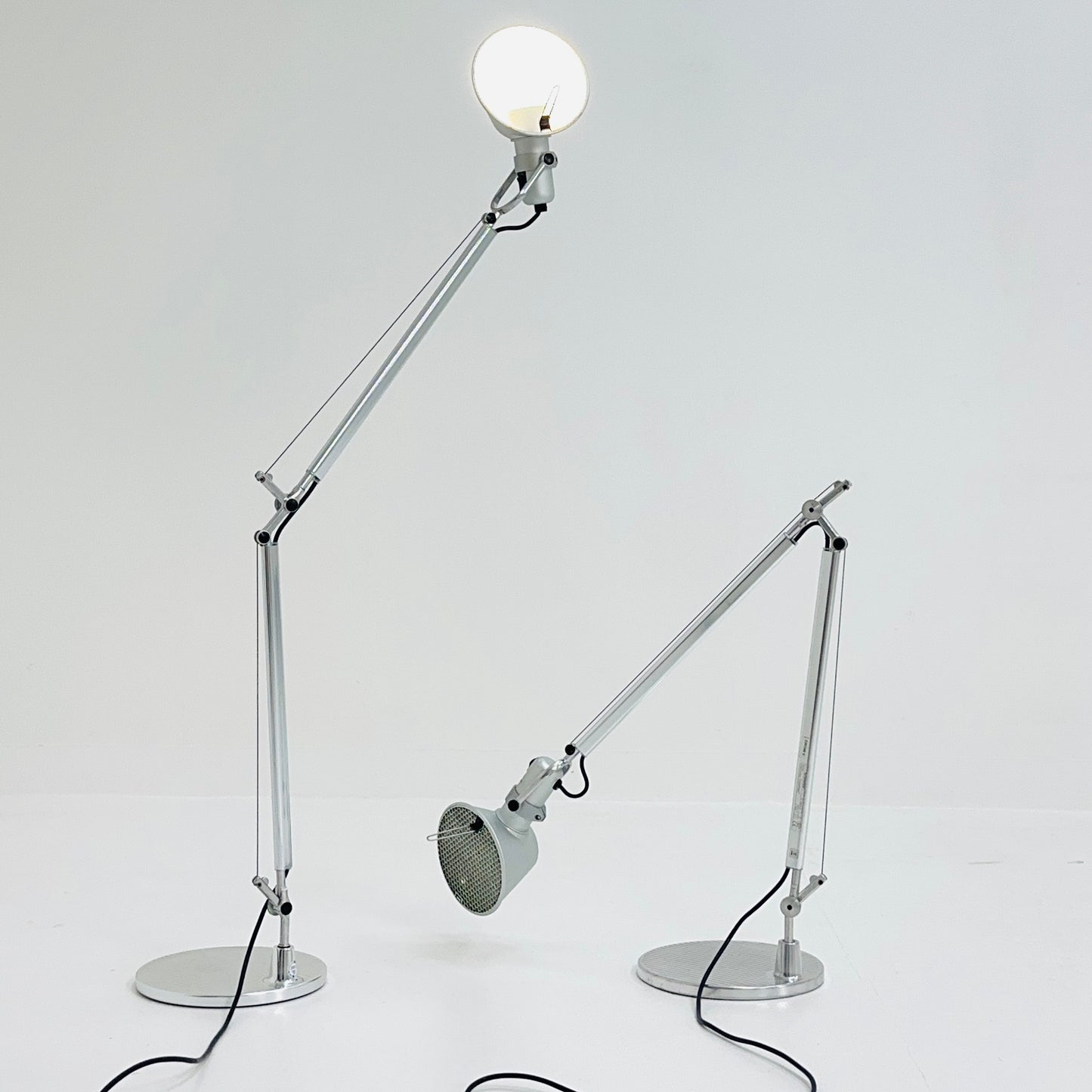 A pair of 'Tolomeo' desktop lamps by Michele De Lucchi & Giancarlo Fassina for Artemide. Italy