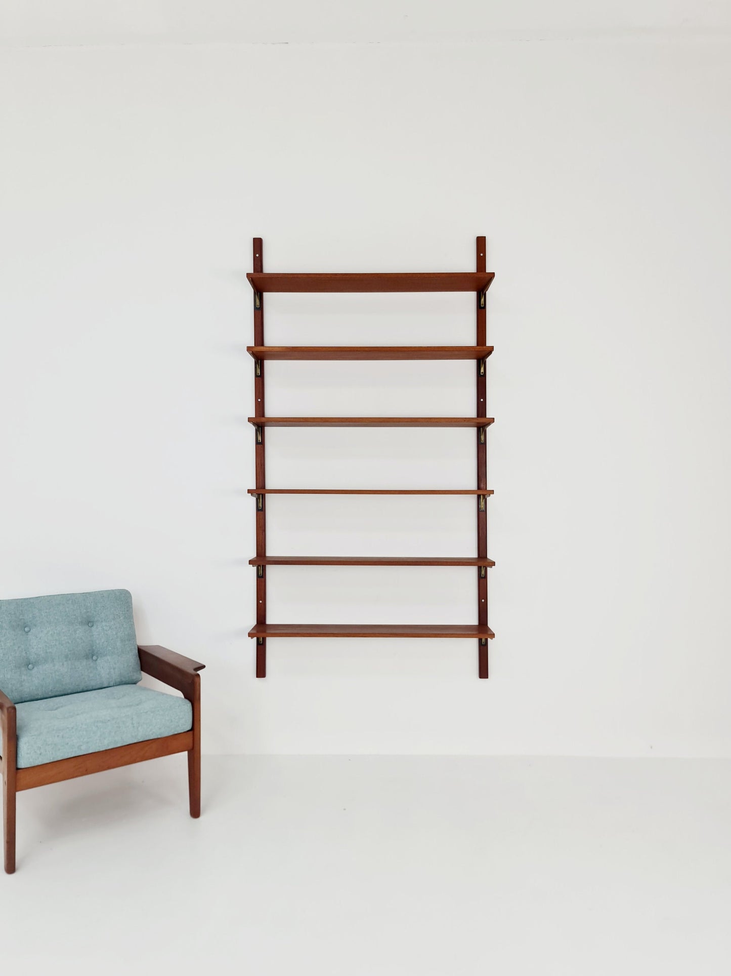 Rare Wall-mounted original teak Danish brass shelf-system bookcase, 1960s