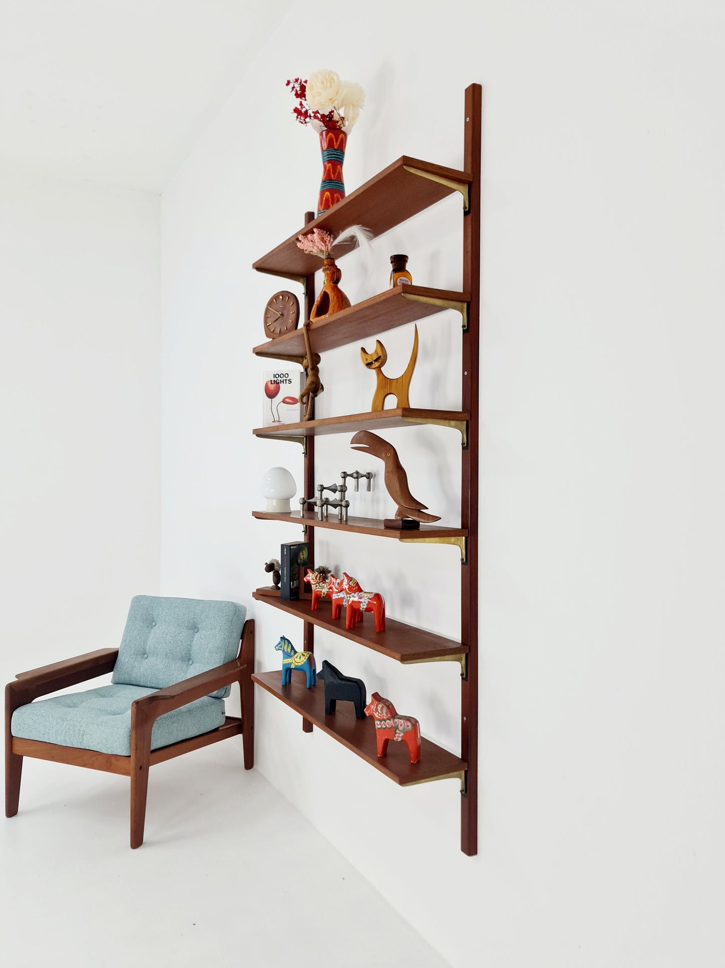 Rare Wall-mounted original teak Danish brass shelf-system bookcase, 1960s