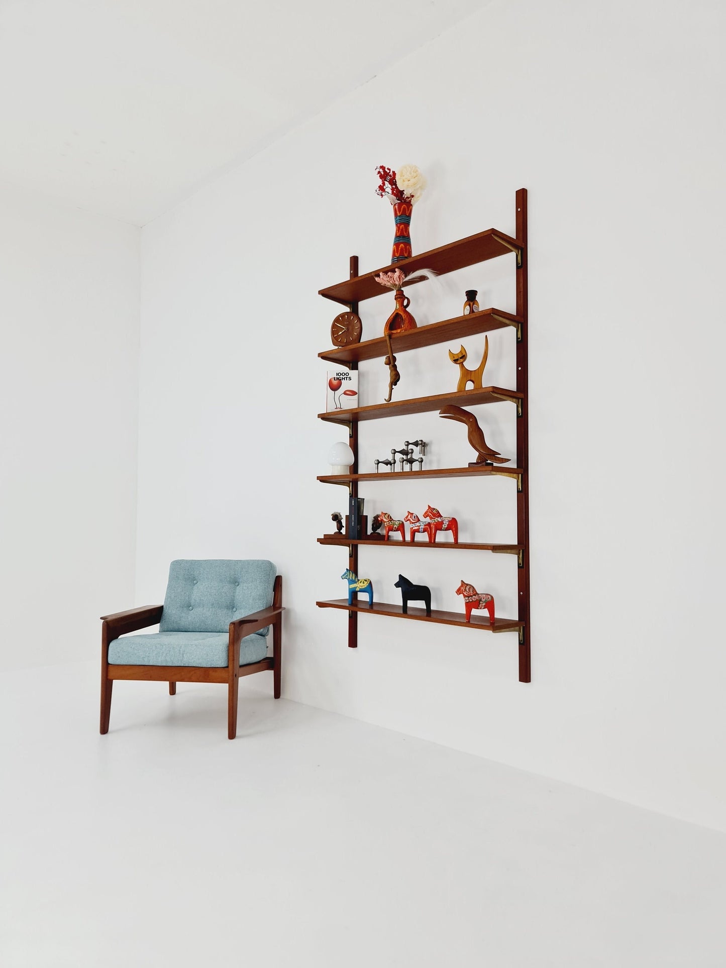 Rare Wall-mounted original teak Danish brass shelf-system bookcase, 1960s