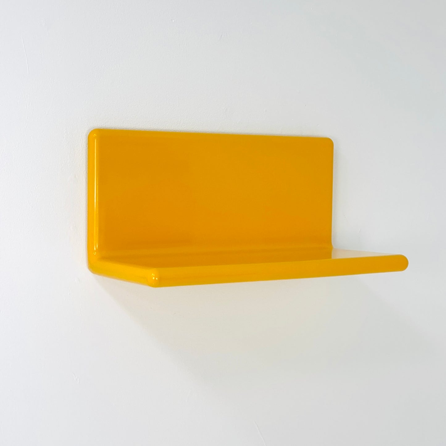 Space age retro yellow wall shelf , west Germany 1980s