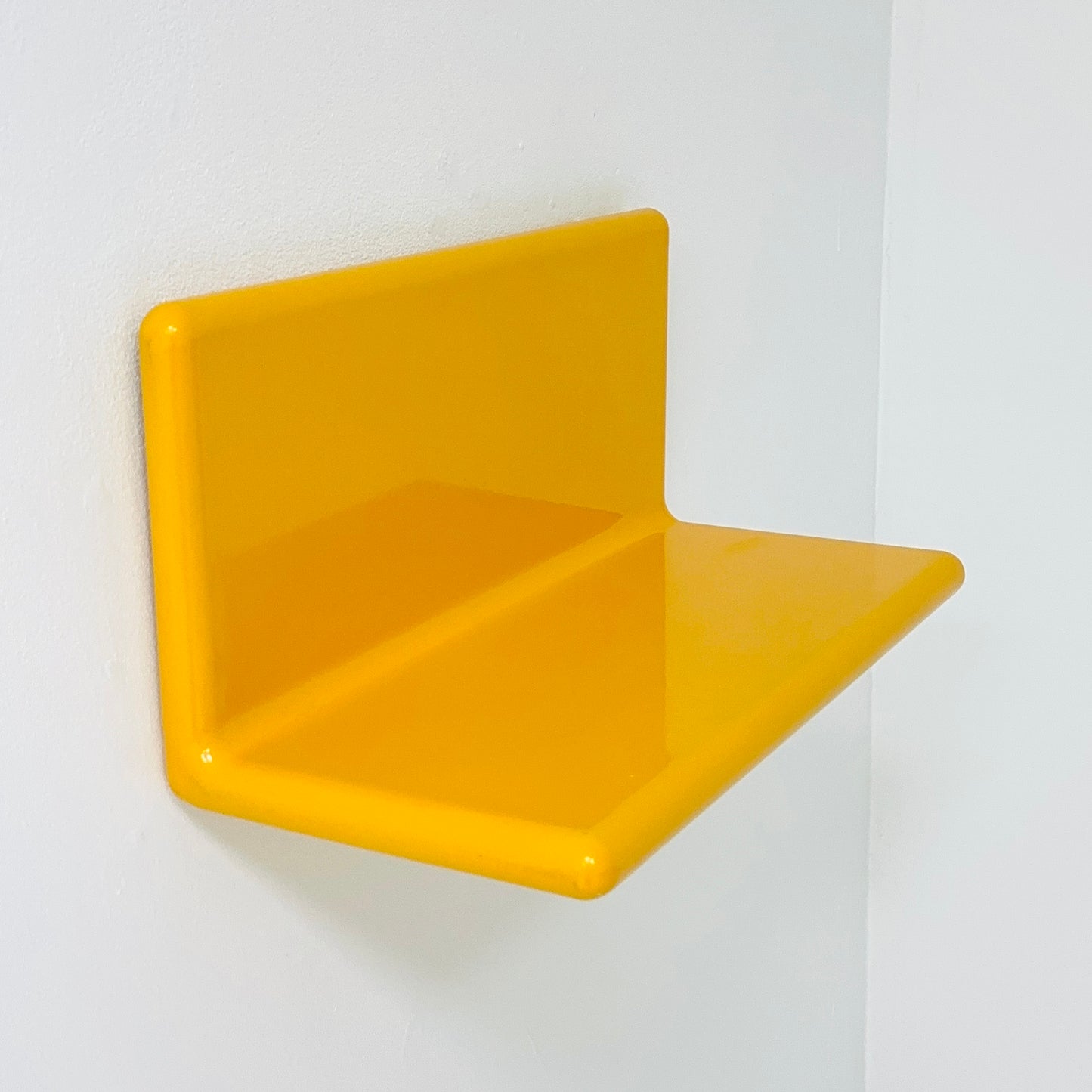 Space age retro yellow wall shelf , west Germany 1980s
