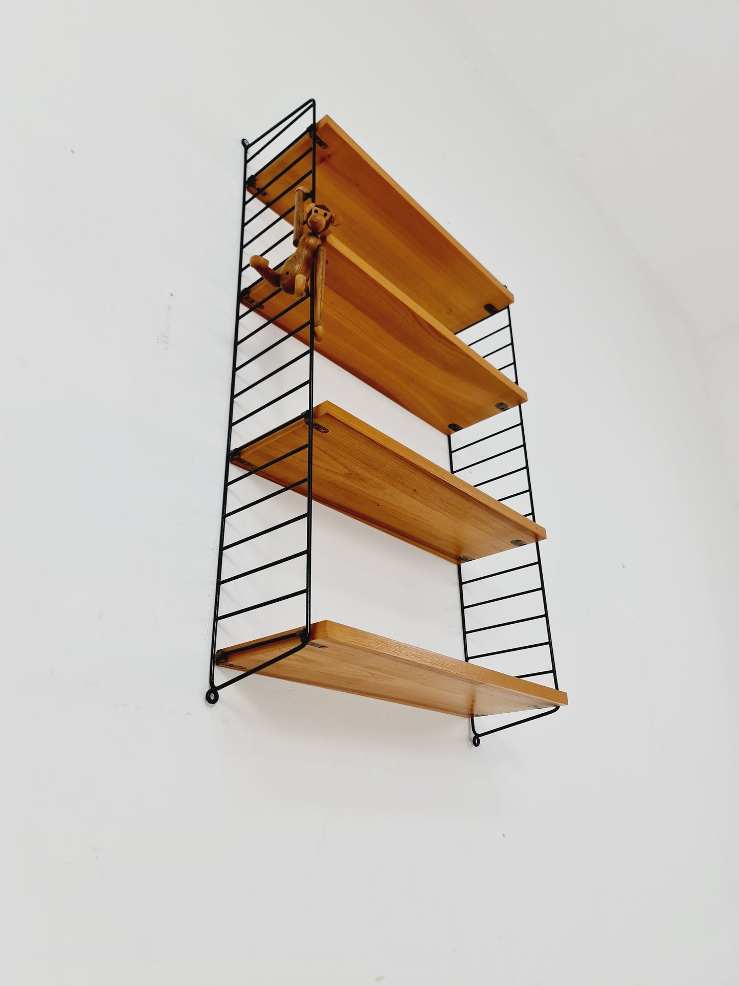 Original MCM Ash shelving system - consists of Black lacquered metal ladders, from string Stockholm 1960s