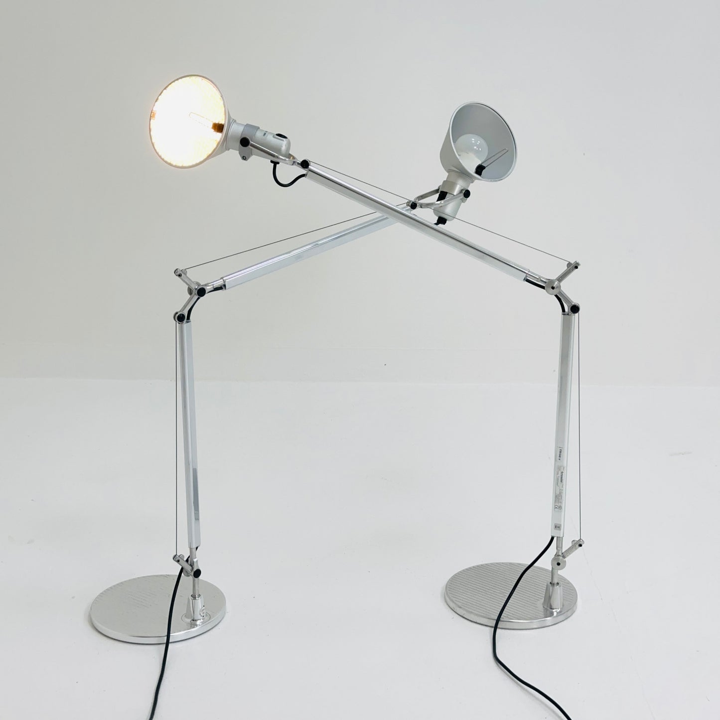 A pair of 'Tolomeo' desktop lamps by Michele De Lucchi & Giancarlo Fassina for Artemide. Italy