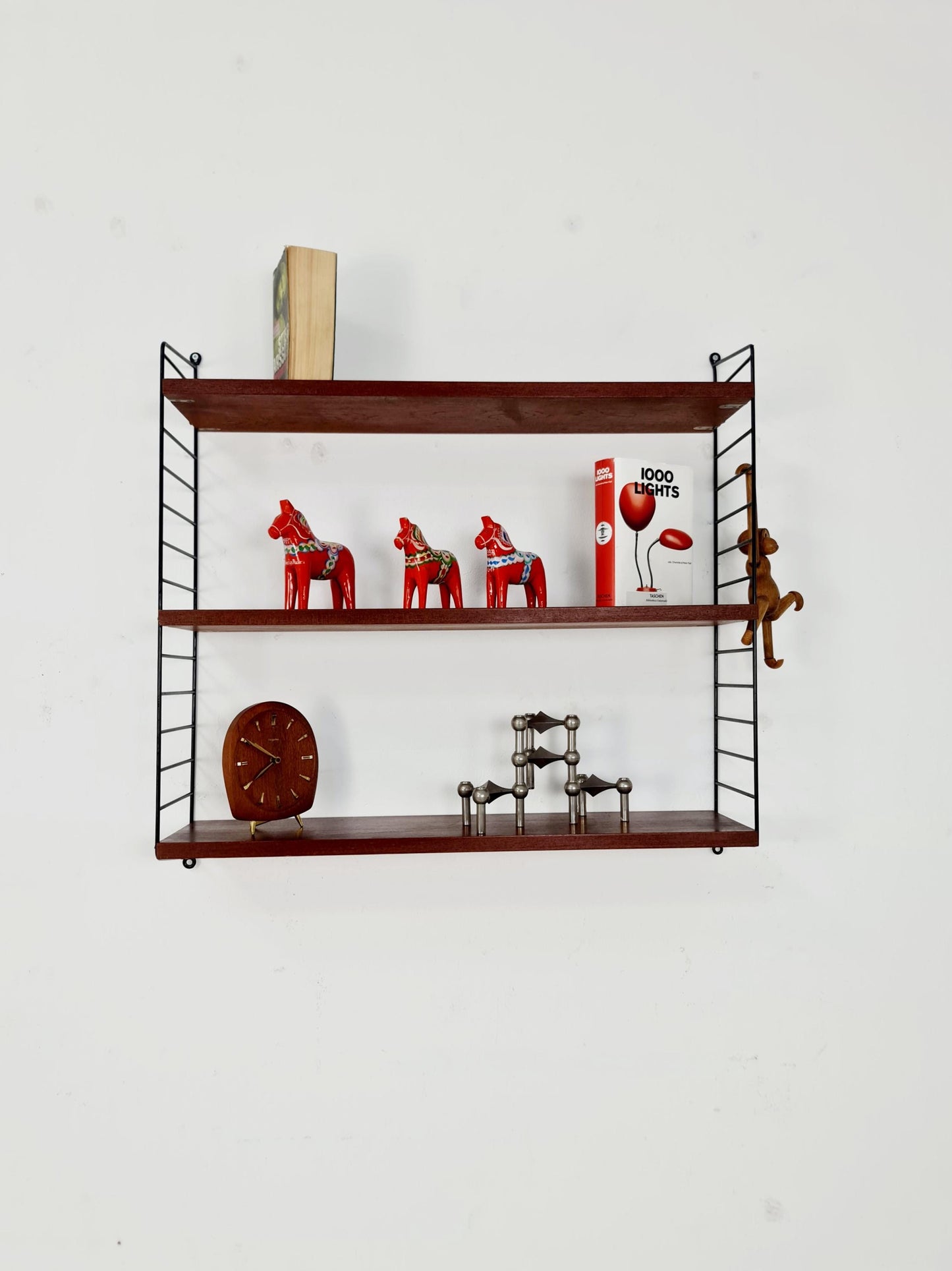 Original MCM Teak shelving system - consists of black lacquered metal ladders, from string Stockholm 1960s