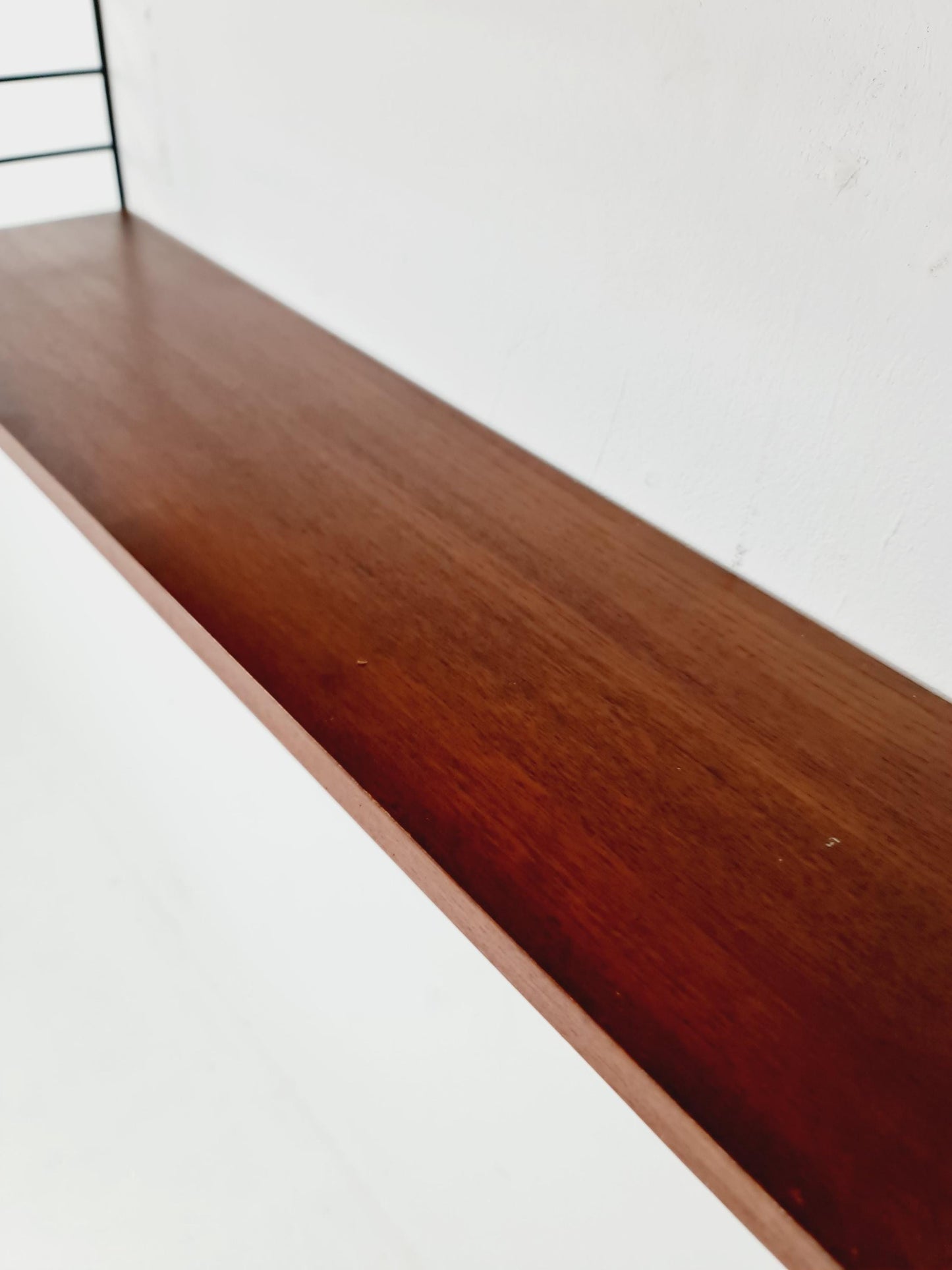 Original MCM Teak shelving system - consists of black lacquered metal ladders, from string Stockholm 1960s