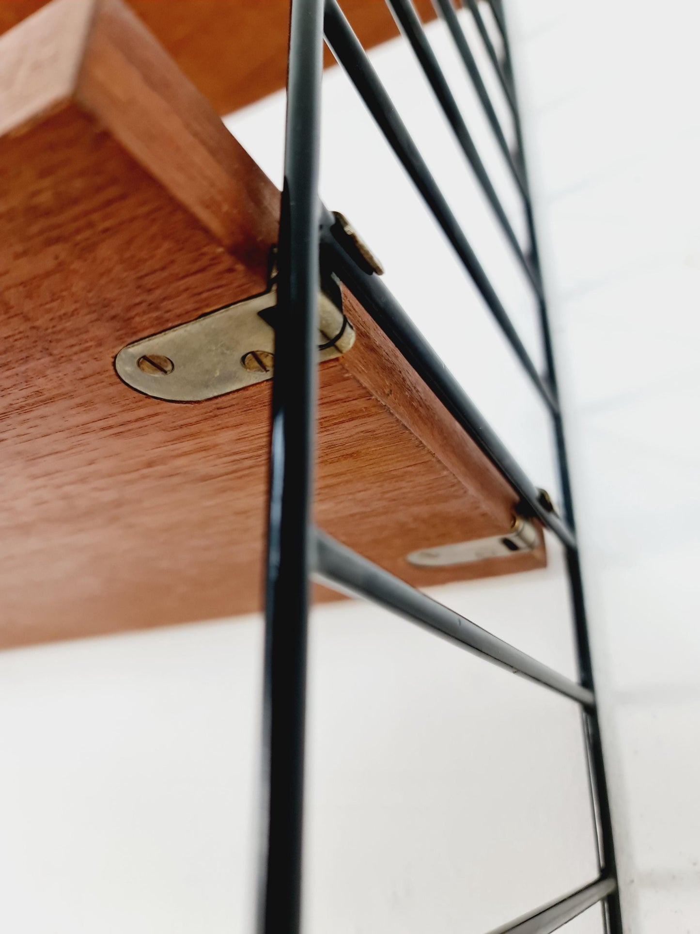 Original MCM Teak shelving system - consists of black lacquered metal ladders, from string Stockholm 1960s