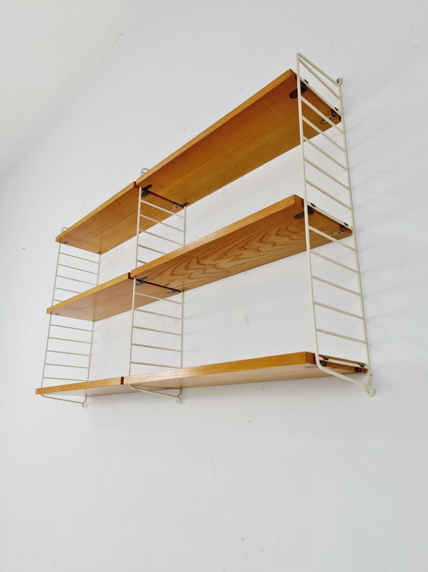 Original MCM Ash shelving system - consists of Black lacquered metal ladders, from string Stockholm 1960s