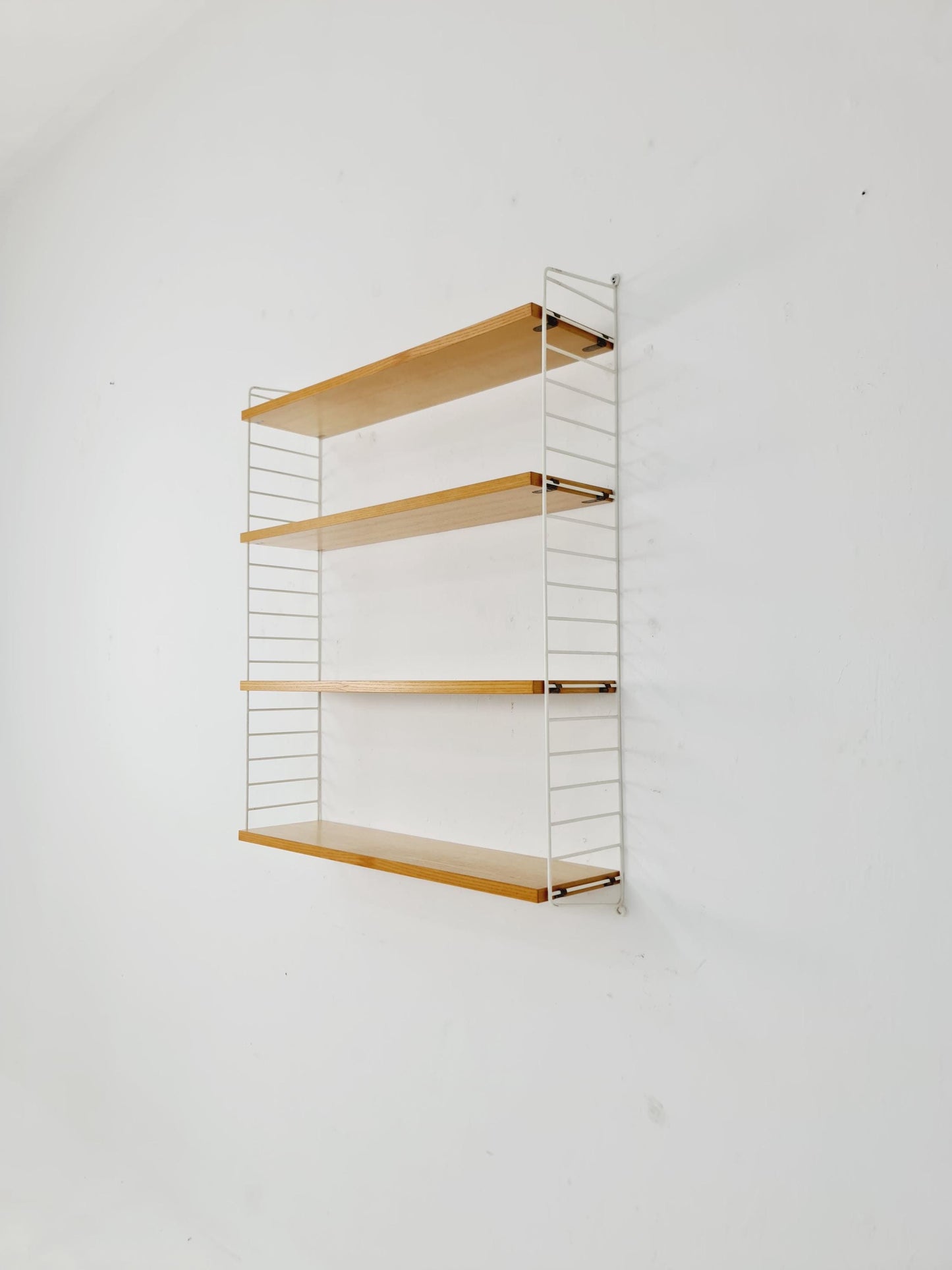 Original MCM Ash shelving system - consists of Black lacquered metal ladders, from string Stockholm 1960s