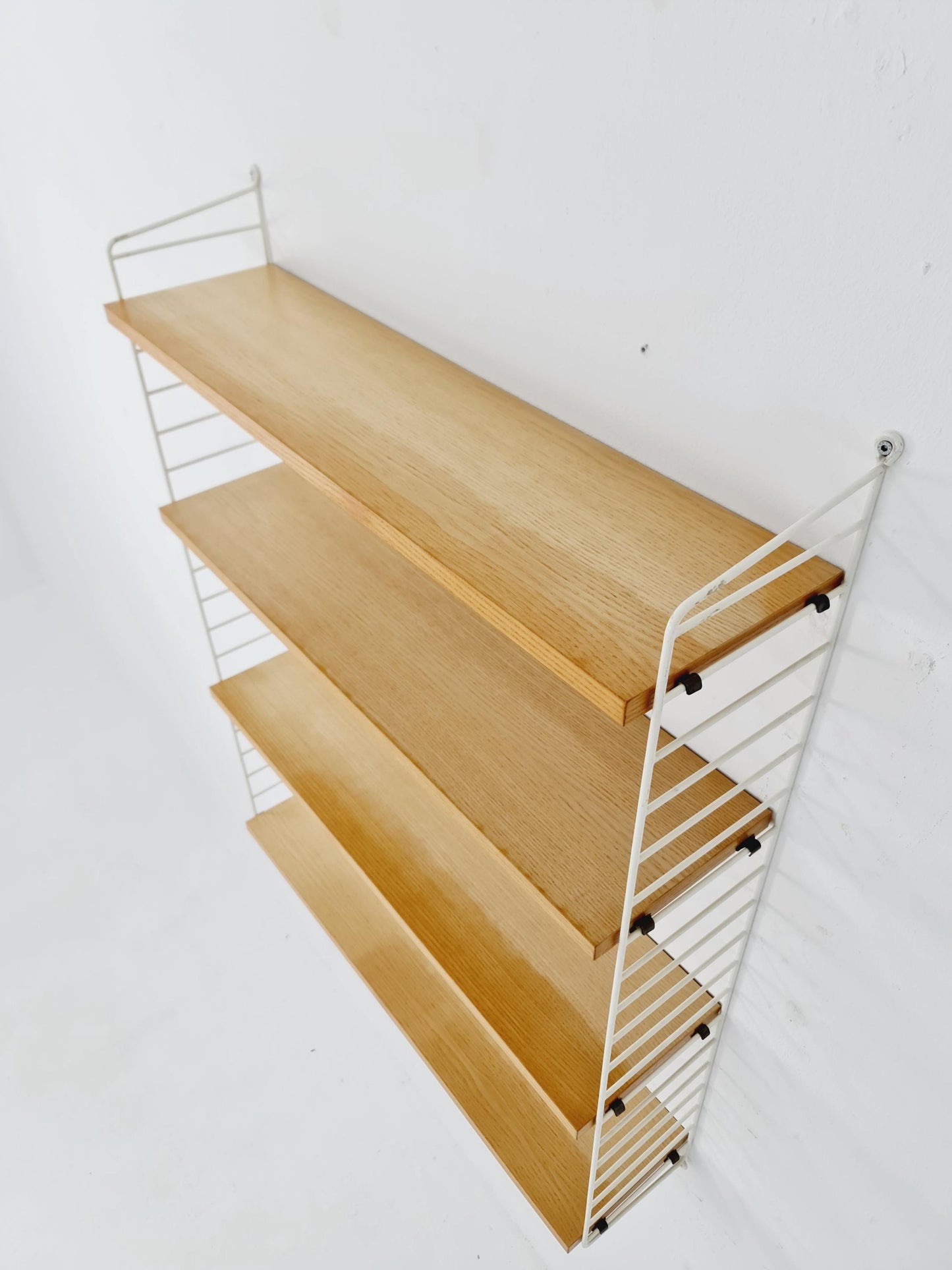 Original MCM Ash shelving system - consists of Black lacquered metal ladders, from string Stockholm 1960s